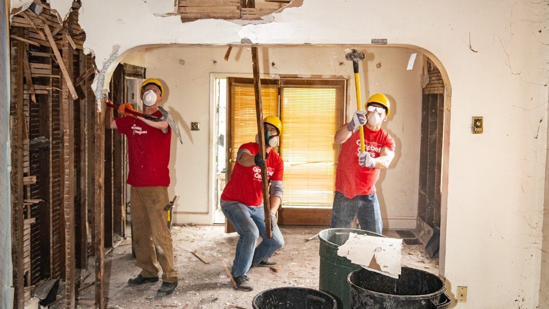 Employees demolishing home during renovation